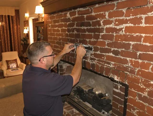 Avon Chimney Sweep expert fixing a fireplace in Avon, CT
